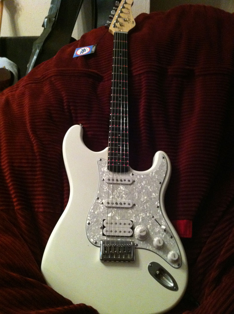 Illustration for article titled The Fretlight Guitar Sets a Shining Example for Hopeful Guitar Heroes